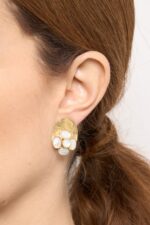 BOUCLES D’OREILLES PERCÉES .