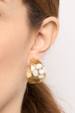 BOUCLES D’OREILLES PERCÉES .