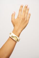 MACHETTE GM WAVES DORE BLANC