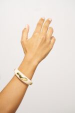 MACHETTE PM WAVES DORE BLANC